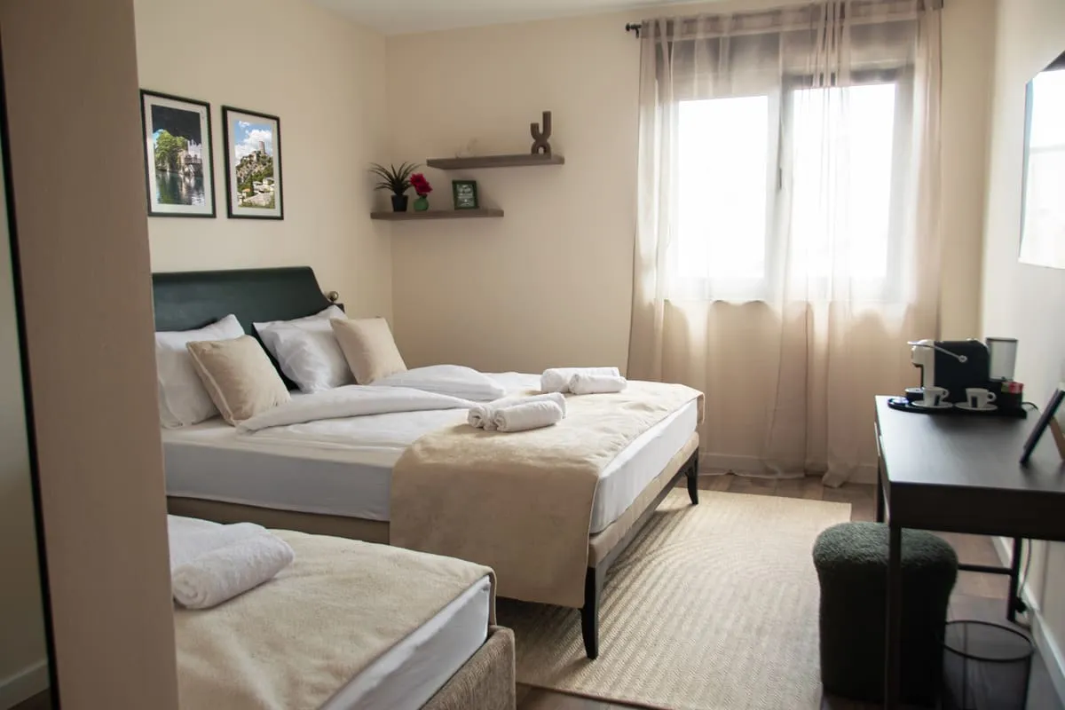 Cozy king-size room interior with Mediterranean olive and clay tones
